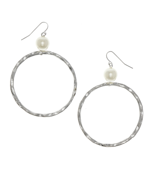 Hammered metal hoop and pearl earring