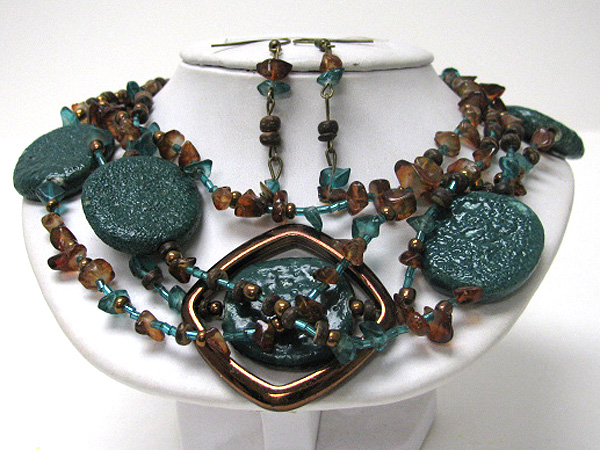 Multi figurine disk and seed bead multi chain necklace earring set