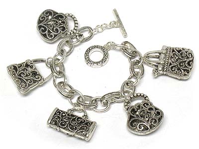 Crystal paved casting metal filigree handbag charm toggle bracelet