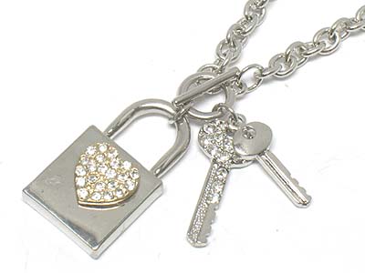 Crystal deco key and lock toggle necklace