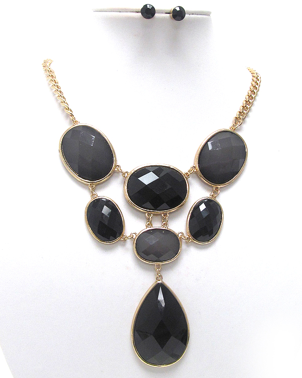 Oval and tear drop glass stone scratch metal necklace earring set