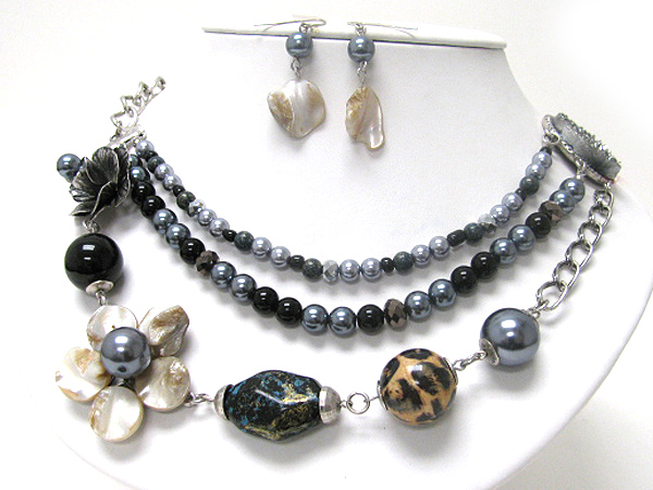 Triple layer pearl and mixed material necklace set