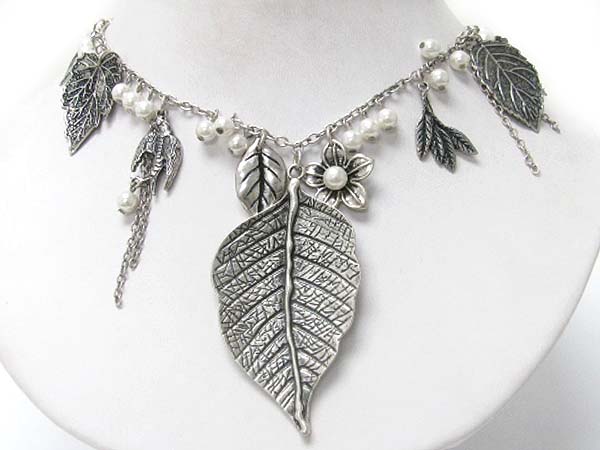 Detail textured metal leaves and flower dangle necklace earring set