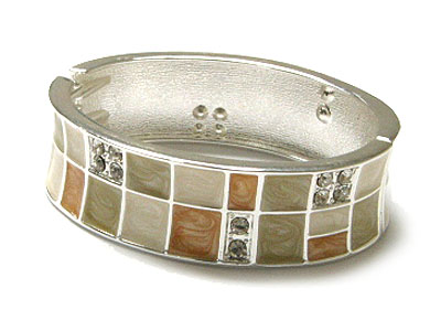 Epoxy and crystal stud metal hinge style bangle