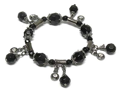 Facet cut acryl beads and crystal charms stretch bracelet 