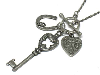 Burnish metal key multi charm toggle necklace 