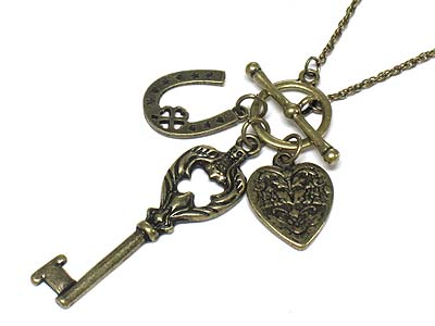 Burnish metal key multi charm toggle necklace 