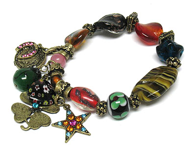 Genuine glass art beads and crystal star and horse shoe charm stretch bracelet