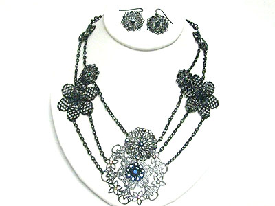 Filigree metal flower and chain link necklace earring set