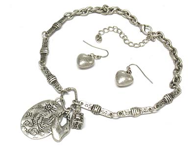 Metal oval pendant and charm necklace and earring set 