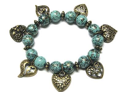 Patina beads and antique heart dangle stretch bracelet