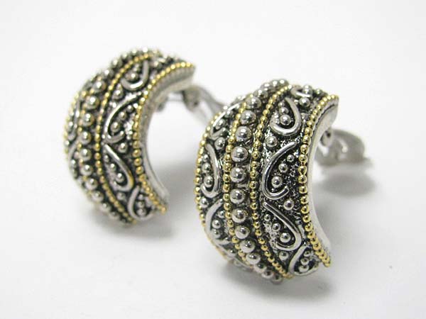 Casting textured metal wide arc clip on earring