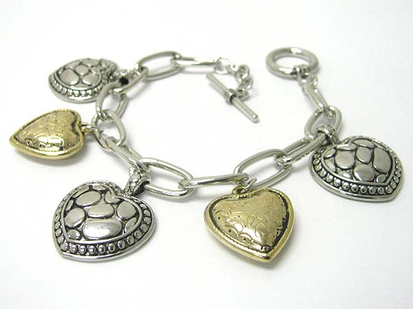 Multi textured metal heart charm dangle bracelet