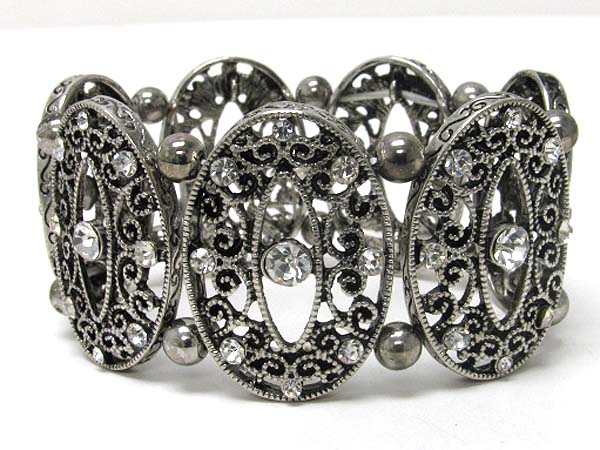 Crystal stud filigree metal oval disk and pearl beads stretch bracelet