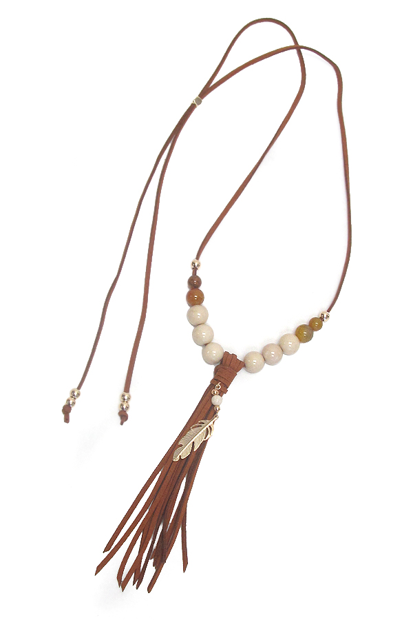 Long leatherette tassel pull tie necklace or choker