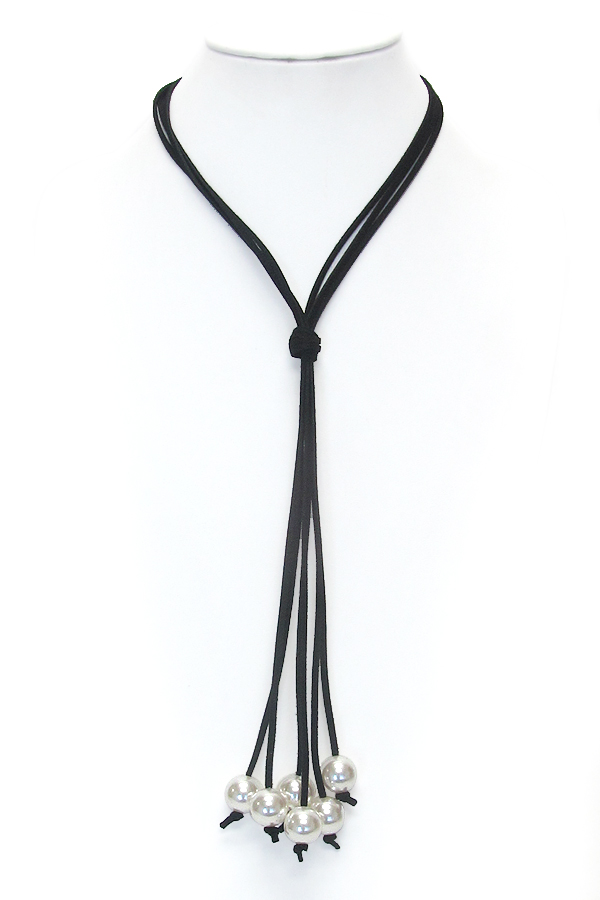 Long leatherette tassel pearl drop necklace