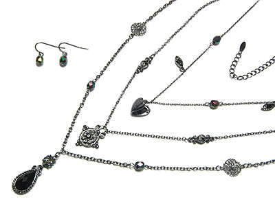 Three row metal filligree crystal drop necklace and earring set