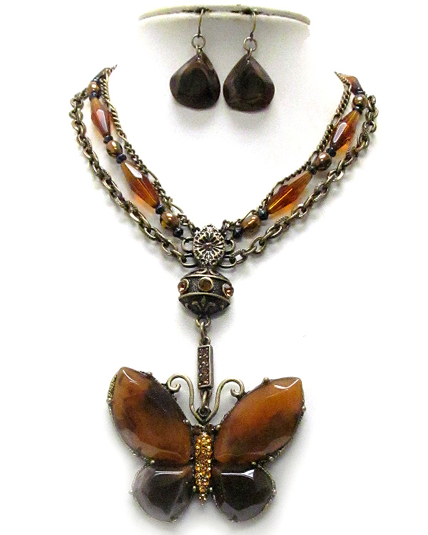 Boutique quality amber tone natural regin and crystal butterfly drop necklace and earring set