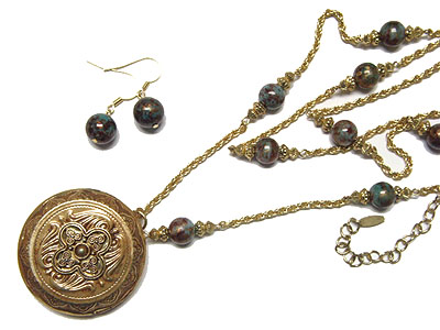 Filigree round locket and patina beads necklace and earring set