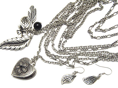 Heart locket and metal leaves necklace and earring set