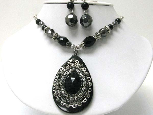 Metal art on facet large tear drop necklace earring set