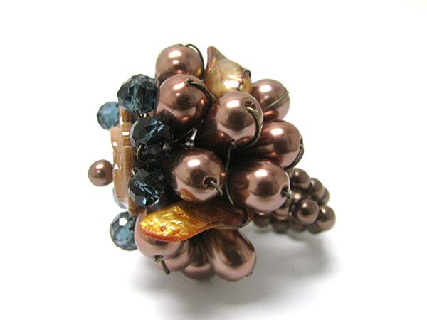 Mixed beads and shell cluster stretch ring