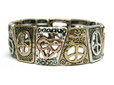 Chicos style antique tri tone metal peace theme stretch bracelet