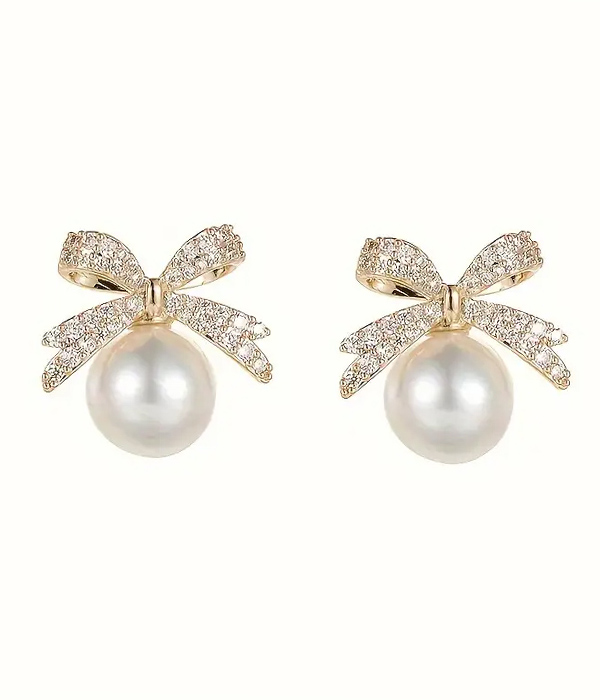 Rhinestone bow and pearl earring