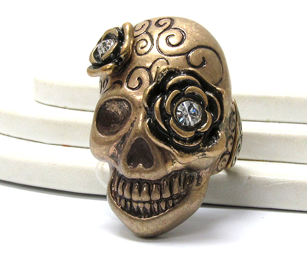 Metal textured with crystal flowers skull stretch ring