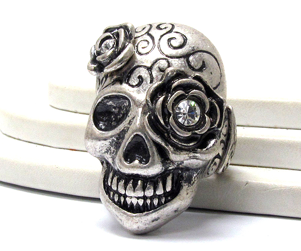 Metal textured with crystal flowers skull stretch ring