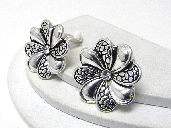 Crystal center patterned flower clip on earrings 