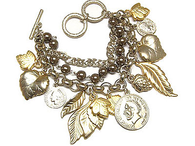 Vintage metal leaves and antique coin charm with multi chain toggle bracelet