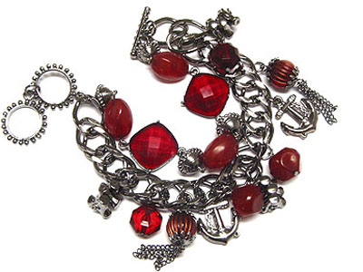 Metal chain link and epoxy stone and anchor charm dangle bracelet