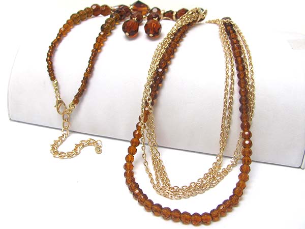 Multi strand facet glass stone and metal chain long necklace earring set