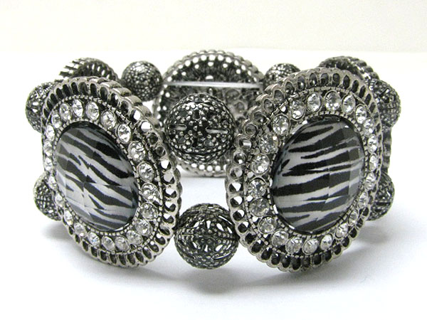 Animal glass and crystal deco filigree metal round disk stretch bracelet