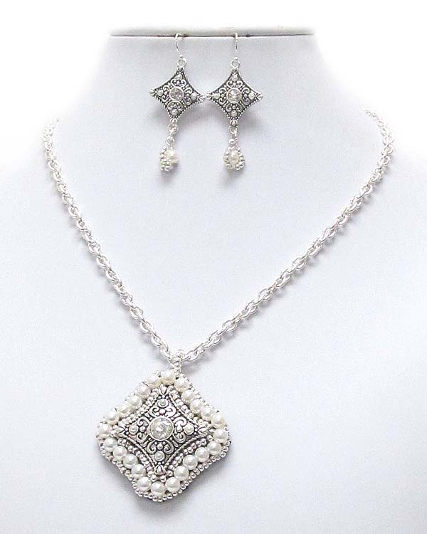 Crystal center and pearl deco on leatherette back pendant necklace earring set