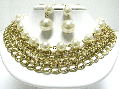 Multi strand chain and pearl necklace set