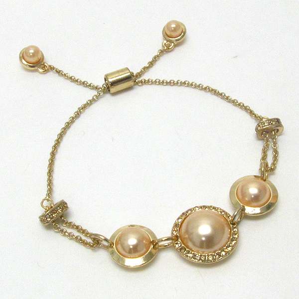 Crystal and triple pearl bracelet