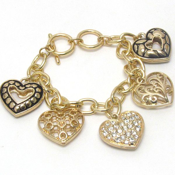 Crystal and metal filigree multi heart charm toggle bracelet