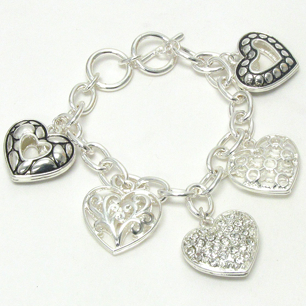 Crystal and metal filigree multi heart charm toggle bracelet