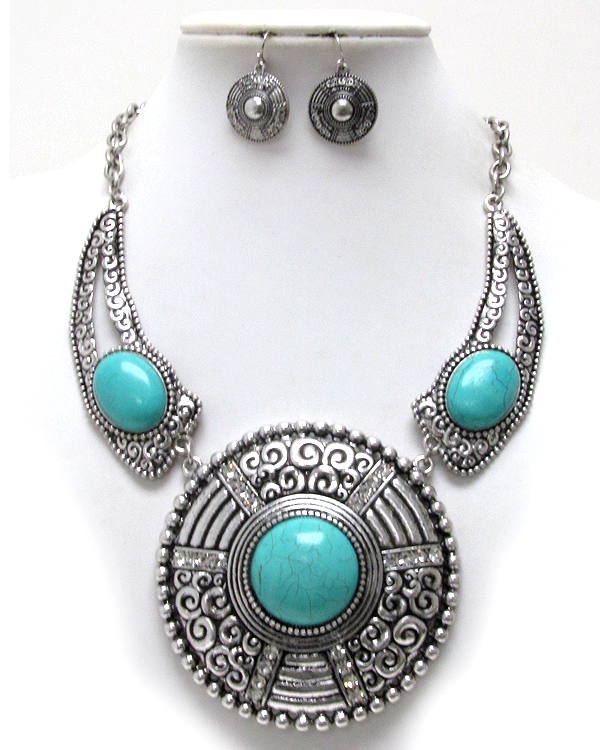 Two small textured horns and turquoise stone and textured metal disk link bib style necklace earring set