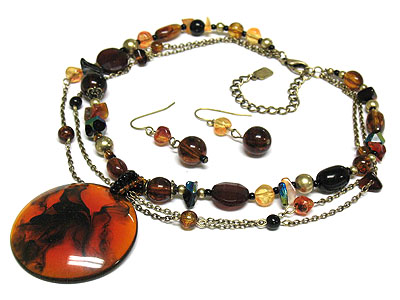 Round pendant glass and all natural material beads necklace and earring set