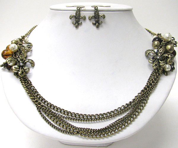 Perl and fleur de lis dual corsage multi chain hanging necklace earring set