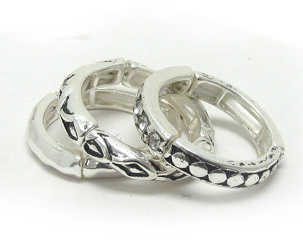 Crystal and metal hamered stackable stretch ring set