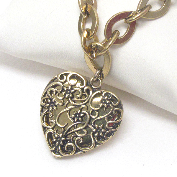 Vintage style metal filigree puff heart pendant and chain necklace