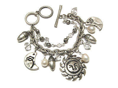 Sun and crecent and acorn charm toggle bracelet