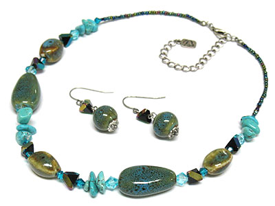 Figurine and natural beads necklace and earring set