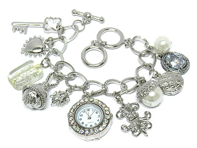 Crystal face and multi charm toggle watch