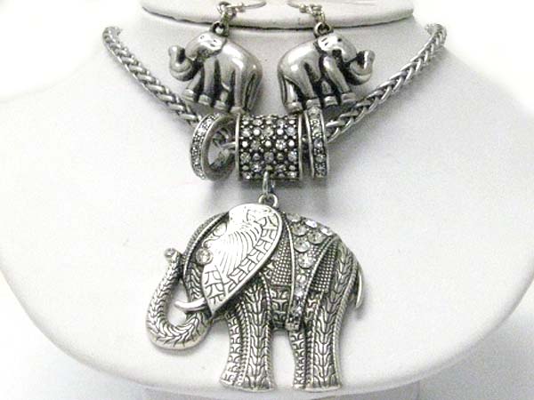 Crystal stud metal tube and elephant charm dangle necklace earring set?