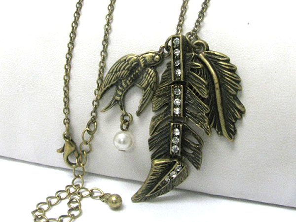 Crystal stud burnish metal feather and bird charm dangle long necklace